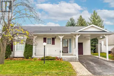 Cozy bungalow with carport and private backyard in Wilmot Creek Adult Lifestyle Community. Lovely lo...
