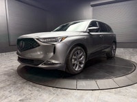 Discover the unmatched sophistication and all-weather capability of the 2023 Acura MDX A-Spec, elega... (image 8)