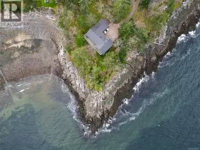 This extraordinary Nanoose Bay waterfront property presents an exceptional 1.04-acre setting—an extr...