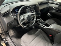 The 2023 Hyundai Santa Cruz Preferred AWD in sleek black offers an extraordinary driving experience... (image 7)