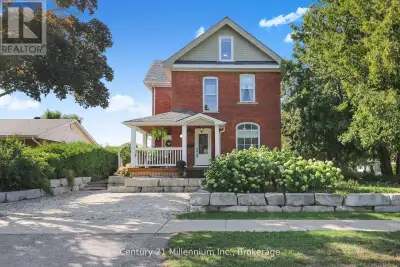 Charming Brick Home on Coveted Tree street in Downtown Collingwood! Located on a desirable corner lo...