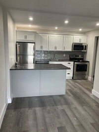 This attractive building is located on a cul-de-sac at the top of Main Avenue in Fairview. Most unit... (image 1)