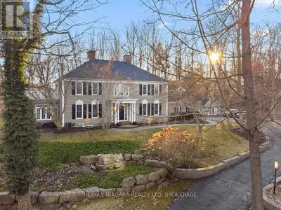 Camelot Hill Estate: A custom-built Georgian Colonial set on 1.2 acres of manicured, tree-lined grou...