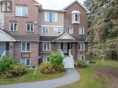 Welcome to 6702 Jean D'Arc Boulevard, Unit B! This beautiful upper unit stacked condo townhouse is i...
