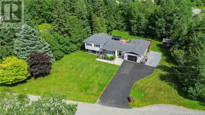 Private Oasis with Luxury Finishes in Beautiful Quispamsis-Tucked away on a quiet dead end street, t...