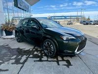 This 2024 Lexus UX 250h Premium presents a strong expression of its crossover qualities, with a bold... (image 3)