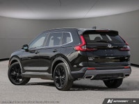 The 2025 Black Honda CR-V Hybrid Touring AWD is your gateway to balanced power and superior handling... (image 3)