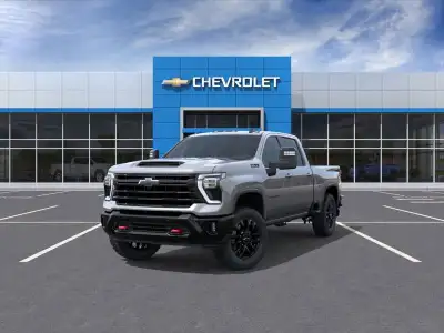 The 2026 Chevrolet Silverado 2500HD 4WD Crew Cab Standard Box LT in a commanding gray color offers a...
