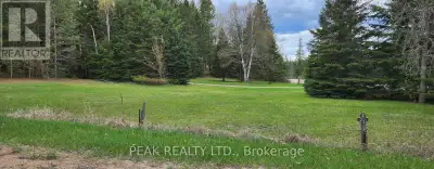 Fantastic opportunity to build your new dream home with a stunning water view! This wooded parcel is...