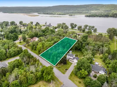 Build your dream home on this beautiful 1-acre wooded lot located in the prestigious Country Club Es...