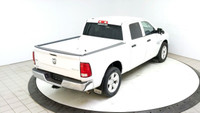 The Ram 1500 Classic SLT, presented in a striking white, is a robust and reliable 4x4 truck, ideal f... (image 9)