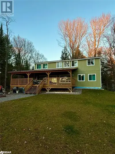 Welcome to your dream waterfront escape! This exceptional property, less than a year old, offers the...