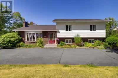 Nestled on 3.13 acres of beautiful, wooded land, this spacious family home is a true retreat for nat...