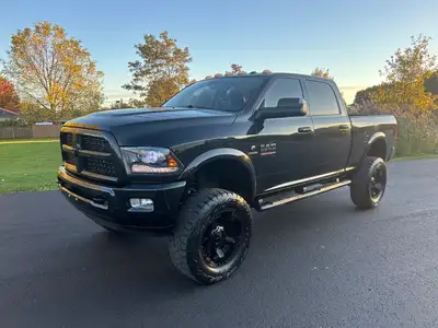 2016 RAM 2500 LARAMIE, 6.7L CUMMINS TURBO DIESEL, AUTOMATIC, 4X4, 244,000KM, 6in. BDS LIFT AND 37in....