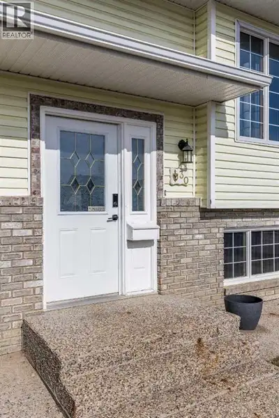 This spacious home offers 2 bedrooms up and 2 down, along with a full ensuite and two additional ful...