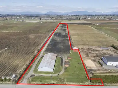 Sought after Morgan Creek neighbourhood. Levelled and drained Prime 10.9 acres of fertile farm land...