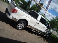 NORTH POINT MOTORS...CALL TEXT 780-224-7791 FINANCING AVAILABLE CHECK OUT THIS 12 FORD F150 SUPER CR... (image 2)