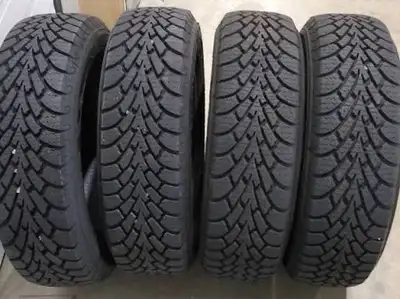 Four Polar-Trax 225/60R18 Winter Tires. Tread Depth 12/32 Seconds! Like New! Call if interested 902-...
