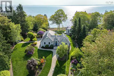 Welcome to Hummingbird Hill- the extraordinary 3 season waterfront property that seamlessly blends m...