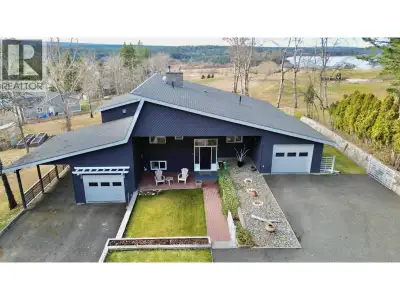Quality-built custom home overlooking the 10th tee at the 108 Golf Course with a marvelous view onto...