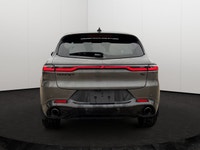 Experience the thrill of the 2024 Dodge Hornet R/T, a plug-in hybrid SUV that effortlessly blends ex... (image 4)