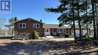 Visit REALTOR® Website for additional information. Spectacular 4-Level Split-entry Home with Attache...