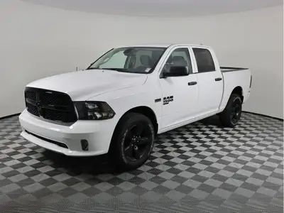You can expect more from our 2023 RAM 1500 Classic Express Night Edition Crew Cab 4X4 in Bright Whit...