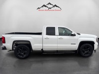 The 2019 GMC Sierra 1500 Limited 4WD Double Cab Standard Box in a striking white color is a robust t... (image 6)