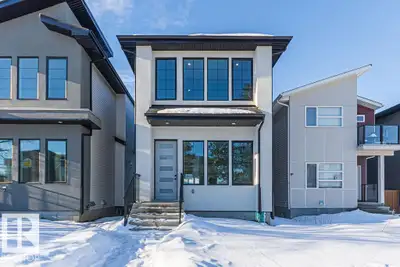 Situated on a lovely tree-lined street in West Jasper Place, this elegant infill home combines style...