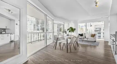 Price: $499,000 / $1,893/mo Spectacular Corner Suite with Wall-to-Wall Windows in the Heart of Downt...