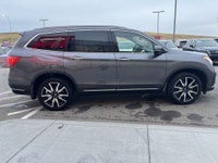 2021 HONDA PILOT TOURING AWD * 8 PASSENGER * MOONROOF FEATURES INCLUDE: - Heated 2nd row seats - Pan... (image 8)