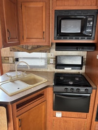 Used family bunk model trailer! The front bedroom features the highly sought after walk around bed a... (image 7)