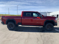 AMVIC Licensed Dealer The 2026 GMC Sierra HD AT4X AEV Edition in Volcanic Red Tintcoat is engineered... (image 9)
