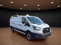 The 2023 Ford Transit Cargo Van, clad in a clean white finish and equipped with rear-wheel drive, of... (image 2)