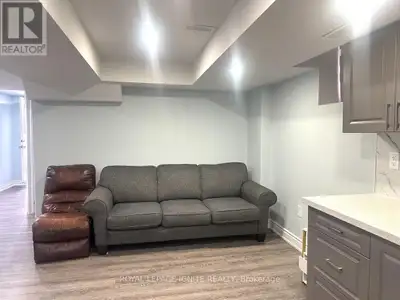 Welcome to this beautifully updated 1-bedroom + den legal basement apartment featuring a privatesepa...
