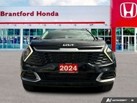 The 2024 Kia Sportage LX, with its advanced all-wheel drive system, delivers confident performance a... (image 9)