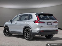 The dynamic 2026 Honda CR-V Sport, in its stunning Silver hue and equipped with all-wheel drive, is... (image 3)