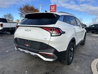 Awarded an IIHS Top Safety Pick, the 2023 Kia Sportage LX in striking Snow White Pearl ensures peace... (image 4)