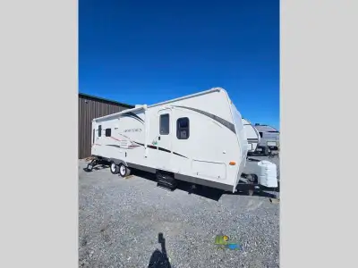 The Sportsmen Show Stopper S281RLSS travel trailer by KZ offers a single slide and a rear living are...