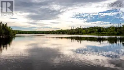 Beautiful, private 2.55-acre waterfront lot on the River Inhabitants. A long gravel driveway and cle...