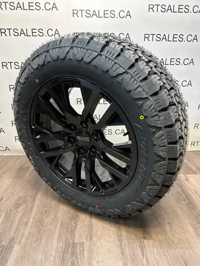 Set of four 275/60/20 Amp Pro All Terrain 20 inch all season tires on rims / wheels -Fits Chevy Chev...