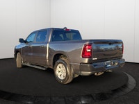 This Ram 1500 has a strong Regular Unleaded V-6 3.6 L/220 engine powering this Automatic transmissio... (image 3)