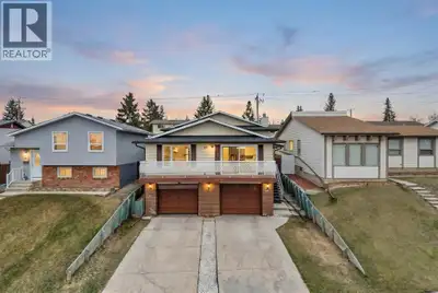 This is not a duplex!. Location!. Welcome to this exceptional custom-built and unique Beddington gem...