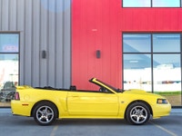 Carget Supercentre is proud to present this 2003 Ford Mustang GT Convertible! EXTERIOR: ZINC YELLOW... (image 4)