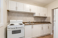 Amenities: Heat & Water Included • Spacious Rooms • Affordable Parking Suite & Building: Bachelor, a... (image 5)