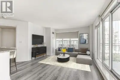 Welcome to the Voyager 1 Condominium and step inside Suite 1211 where you are greeted by breathtakin...