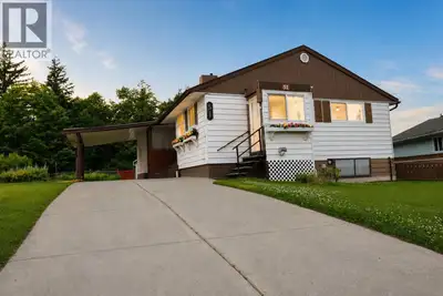 Move-in ready and exceptionally well-maintained, this rancher with basement offers four bedrooms and...