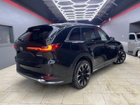 The 2024 Mazda CX-90 PHEV GT in a stunning black finish offers the perfect blend of luxurious style... (image 2)