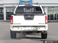 Ready for any adventure or workday, this 2018 Nissan Frontier Crew Cab Pickup in striking Glacier Wh... (image 3)