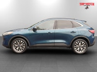 This 2020 Ford Escape Titanium Hybrid features a 4-cylinder hybrid engine paired with an automatic t... (image 1)